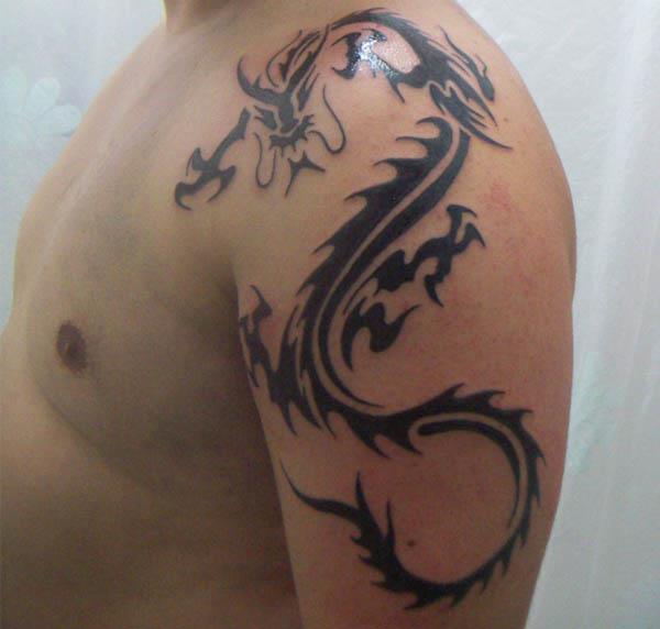Back tribal dragon tattoo Great tattoo