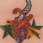 Stabbed Heart and Nautical Stars Tattoo