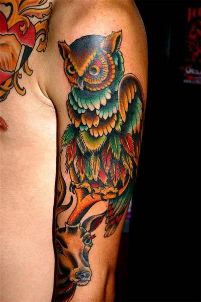 owl perched on antler tattoo Owl Perched on Antler Tattoo