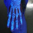 Blacklight Skeleton Arm Tattoo