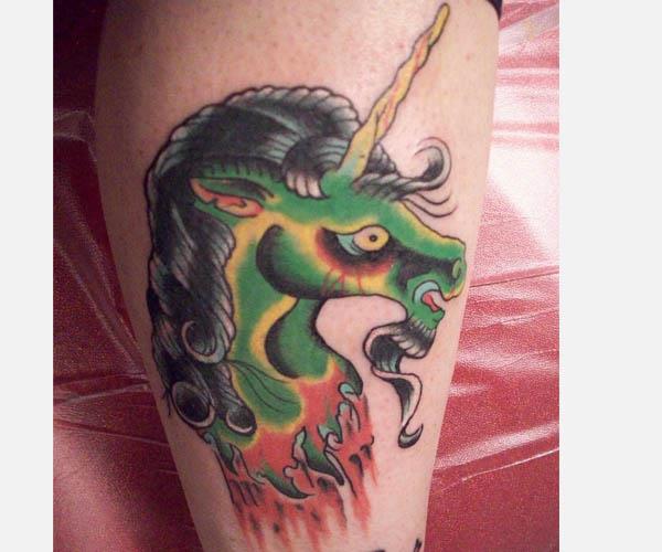 severed head zombie unicorn tattoo Unbelievably Weird Unicorn Tattoos