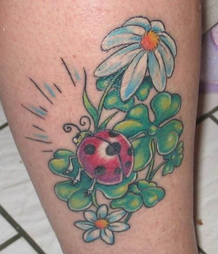 cartoon ladybug on clovers tattoo Cartoon Ladybug on Clovers