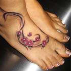 cherry blossom tribal foot tattoo th Tattoo Spots