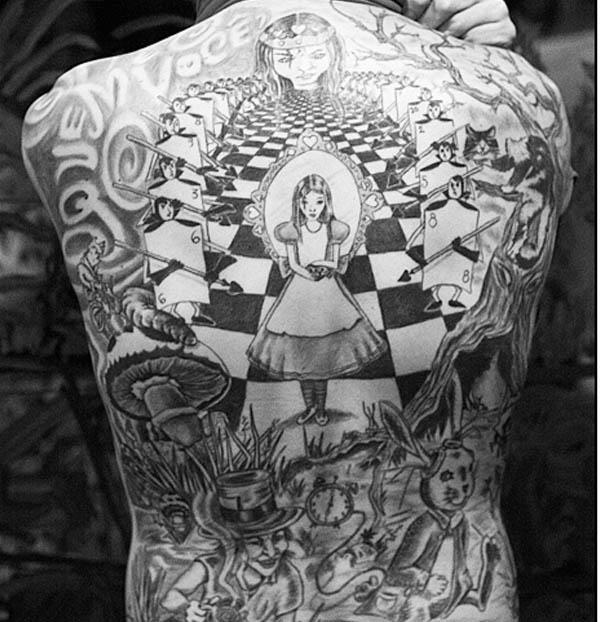 original alice in wonderland black back piece Ink in Wonderland: 25 Mad Alice in Wonderland Tattoos