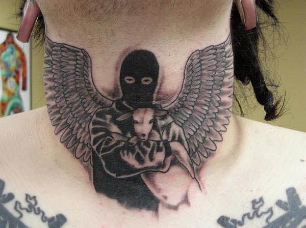 animal liberation masked man with calf tattoo Vegan Tattoos Are Hardcore